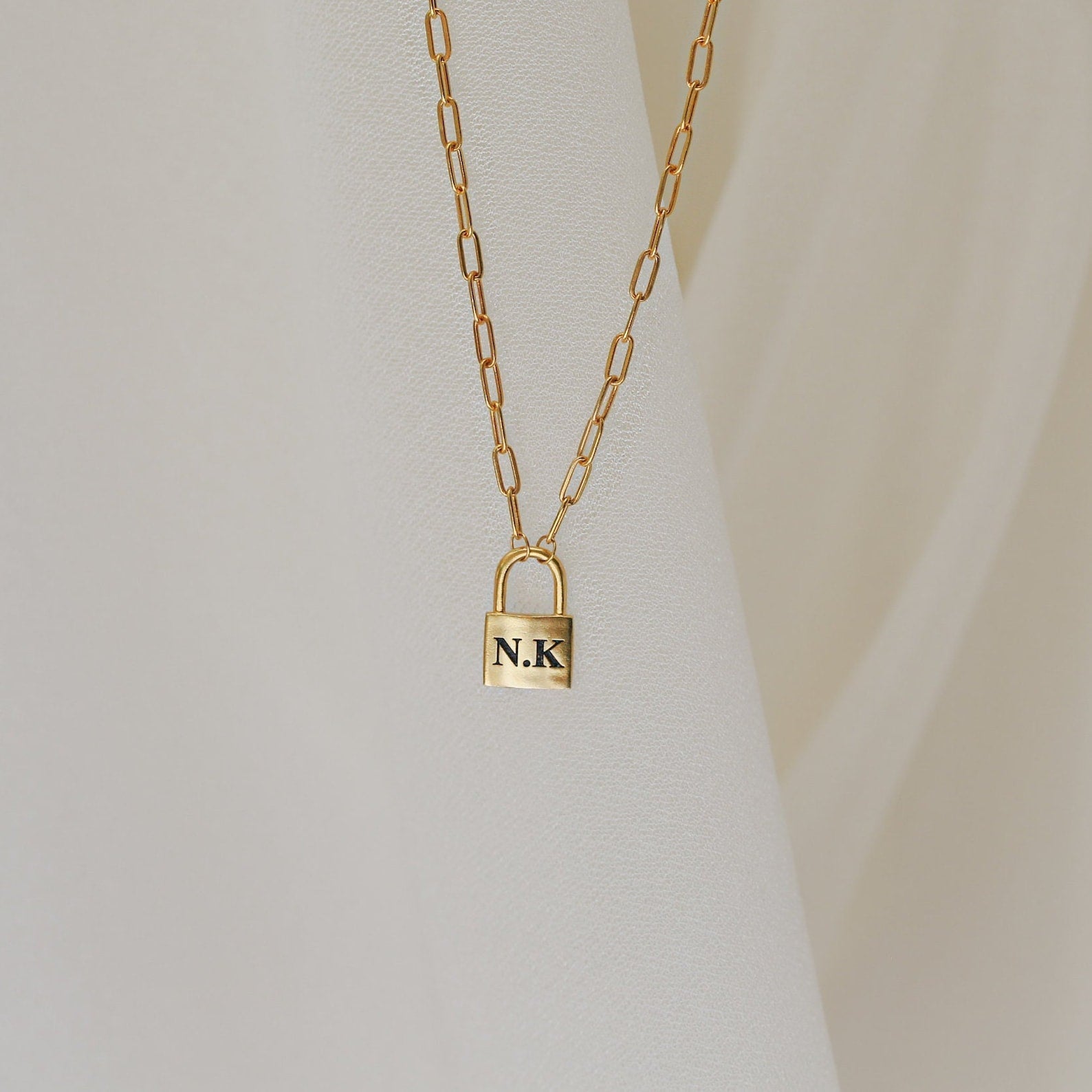  Madison Fero 18K Gold / 14 Inches / One Side-18K Gold / 14 Inches / Both Sides (+$8)-18K Gold / 15 Inches / One Side-18K Gold / 15 Inches / Both Sides (+$8)-18K Gold / 16 Inches / One Side-18K Gold / 16 Inches / Both Sides (+$8)-18K Gold / 17 Inches / One Side-18K Gold / 17 Inches / Both Sides (+$8)-18K Gold / 18 Inches / One Side-18K Gold / 18 Inches / Both Sides (+$8) Padlock Paperclip Necklace